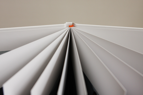 �������b